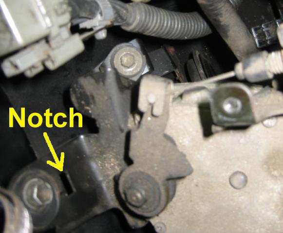 Notch for speed control actuator cover