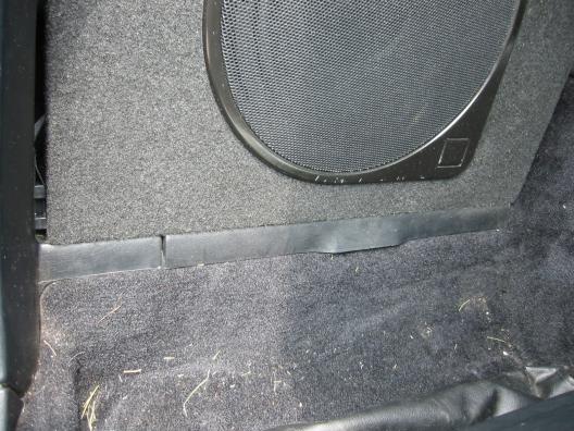 Sub enclosure fitment