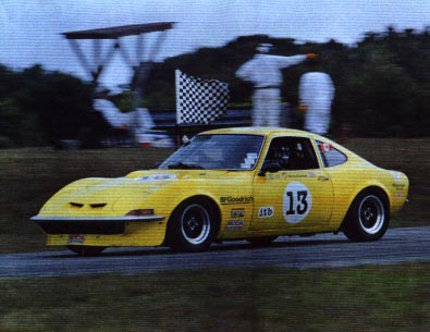 Yellow ITB Opel GT with checkered flag
